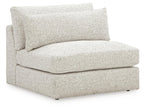 Armless chair in light speckled fabric, boxy seat and back, dark feet