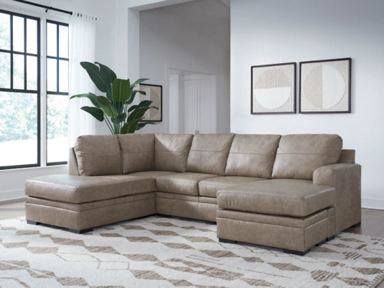 Beige sectional sofa with chaise extension and multiple back cushions