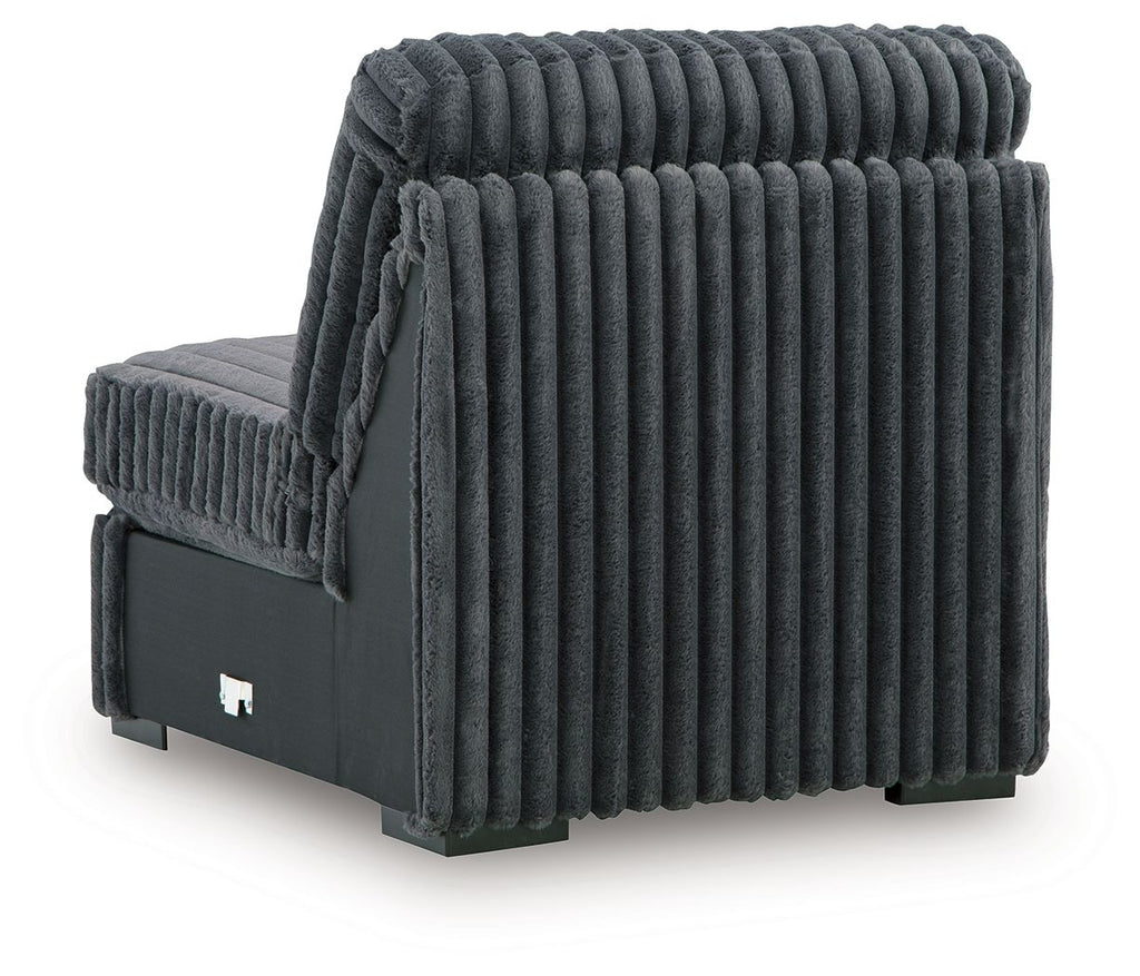 Gunmetal armless chair with ribbed vertical tufted upholstery and square black base
