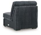 Gunmetal armless chair with ribbed vertical tufted upholstery and square black base