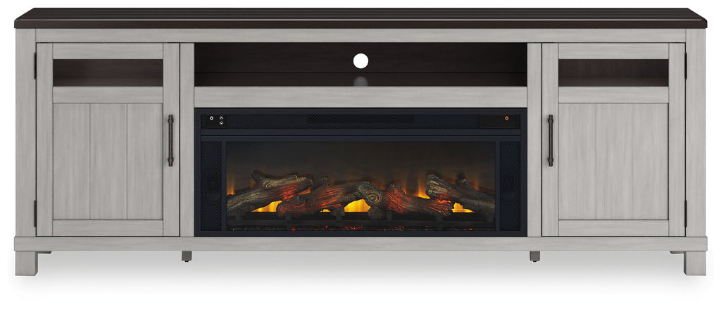 Gray TV stand with glass-front electric fireplace insert and center media shelf