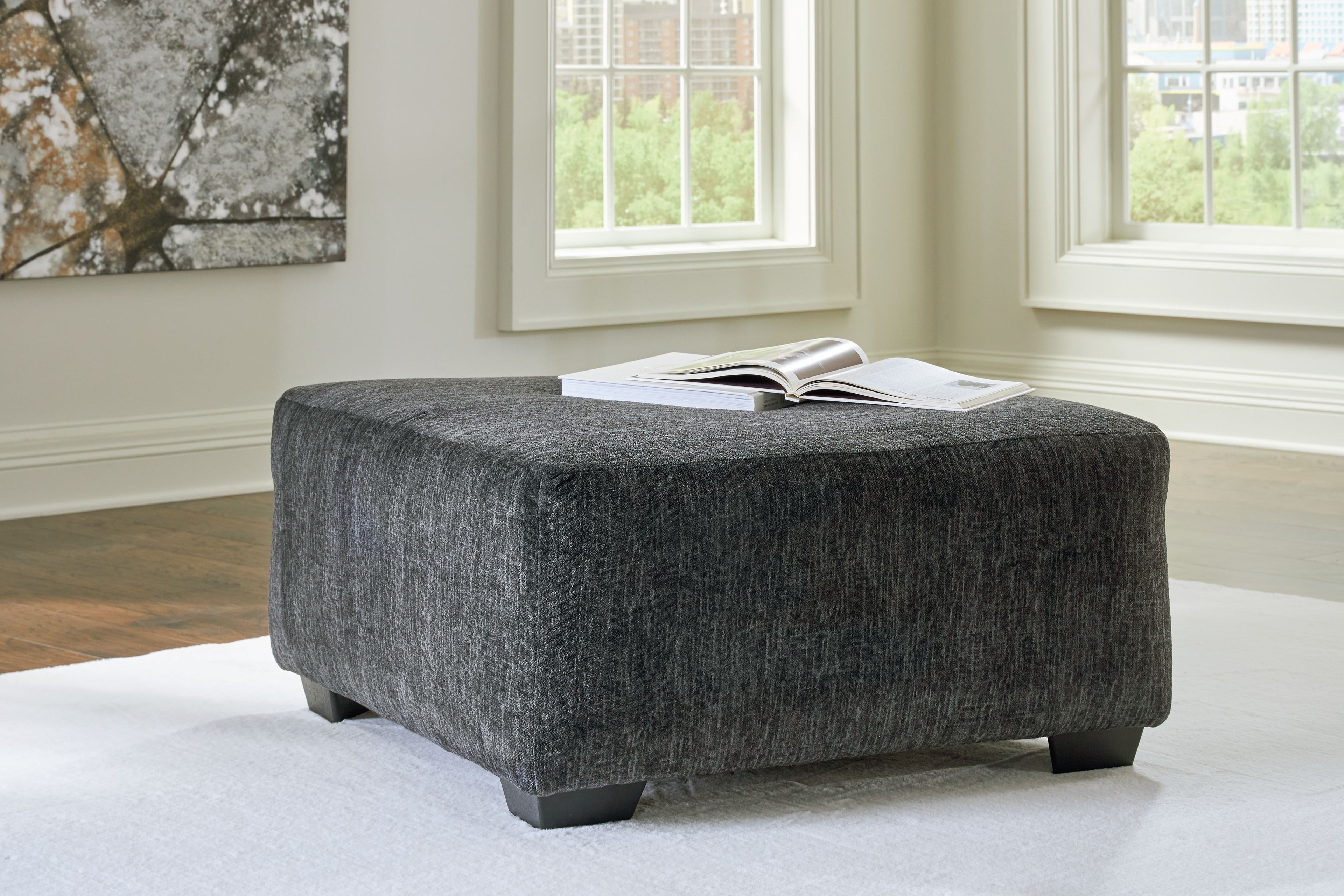 Oversized accent ottoman, dark gray textured fabric, low block feet