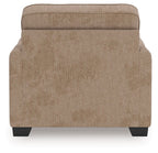 Light brown upholstered chair and a half back panel with dark legs