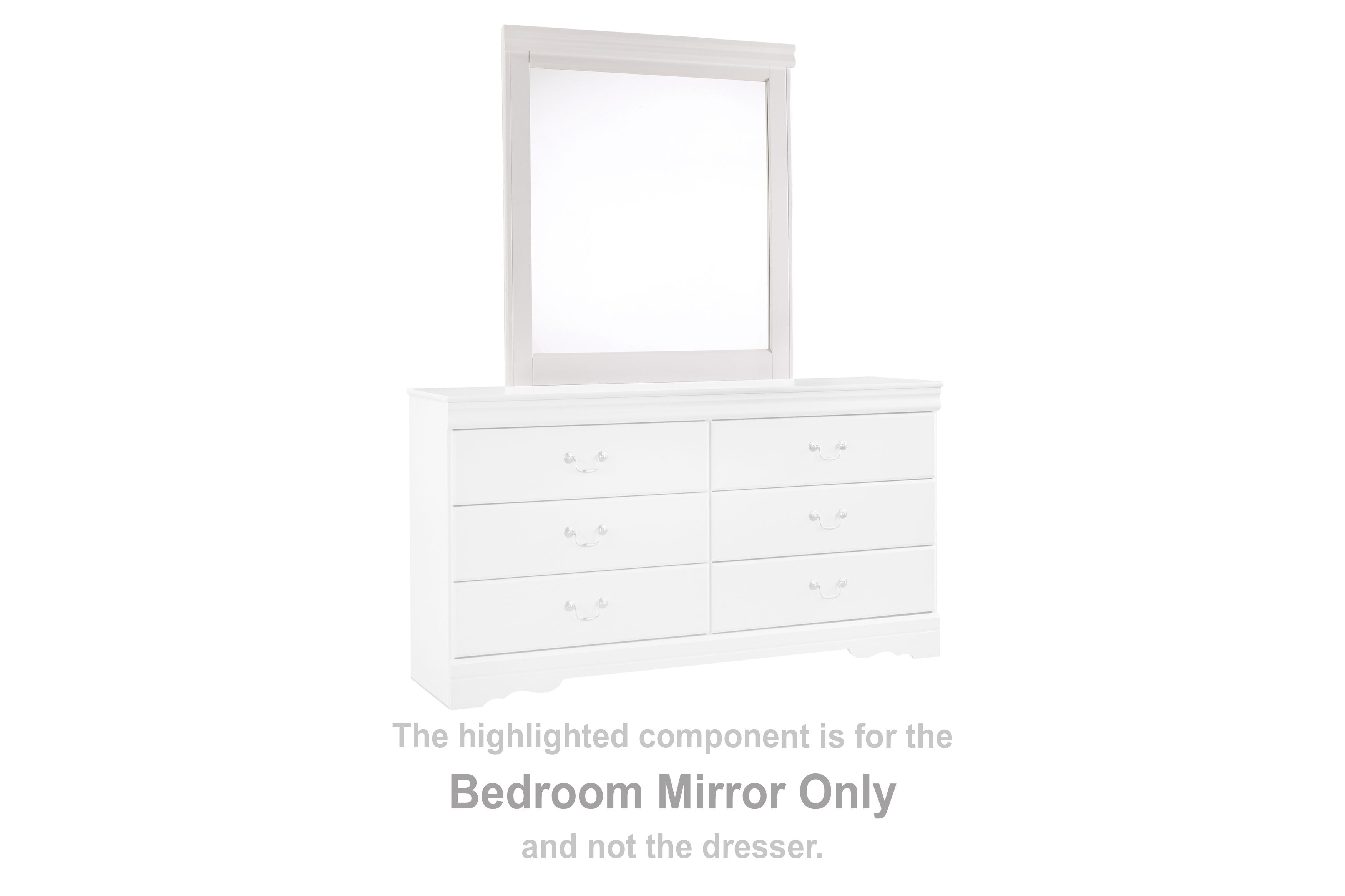 White rectangular bedroom mirror on top of a dresser with six drawer fronts