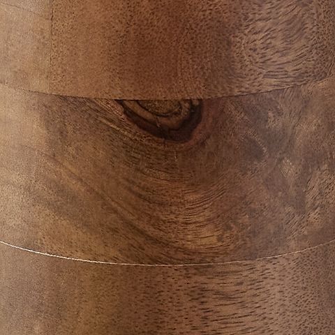 Wood lamp base close-up with circular grain pattern and warm brown finish