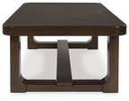Dark brown rectangular cocktail table with lower shelf and turned legs