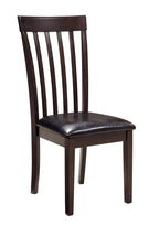 Dark brown slat-back dining chair with black padded seat