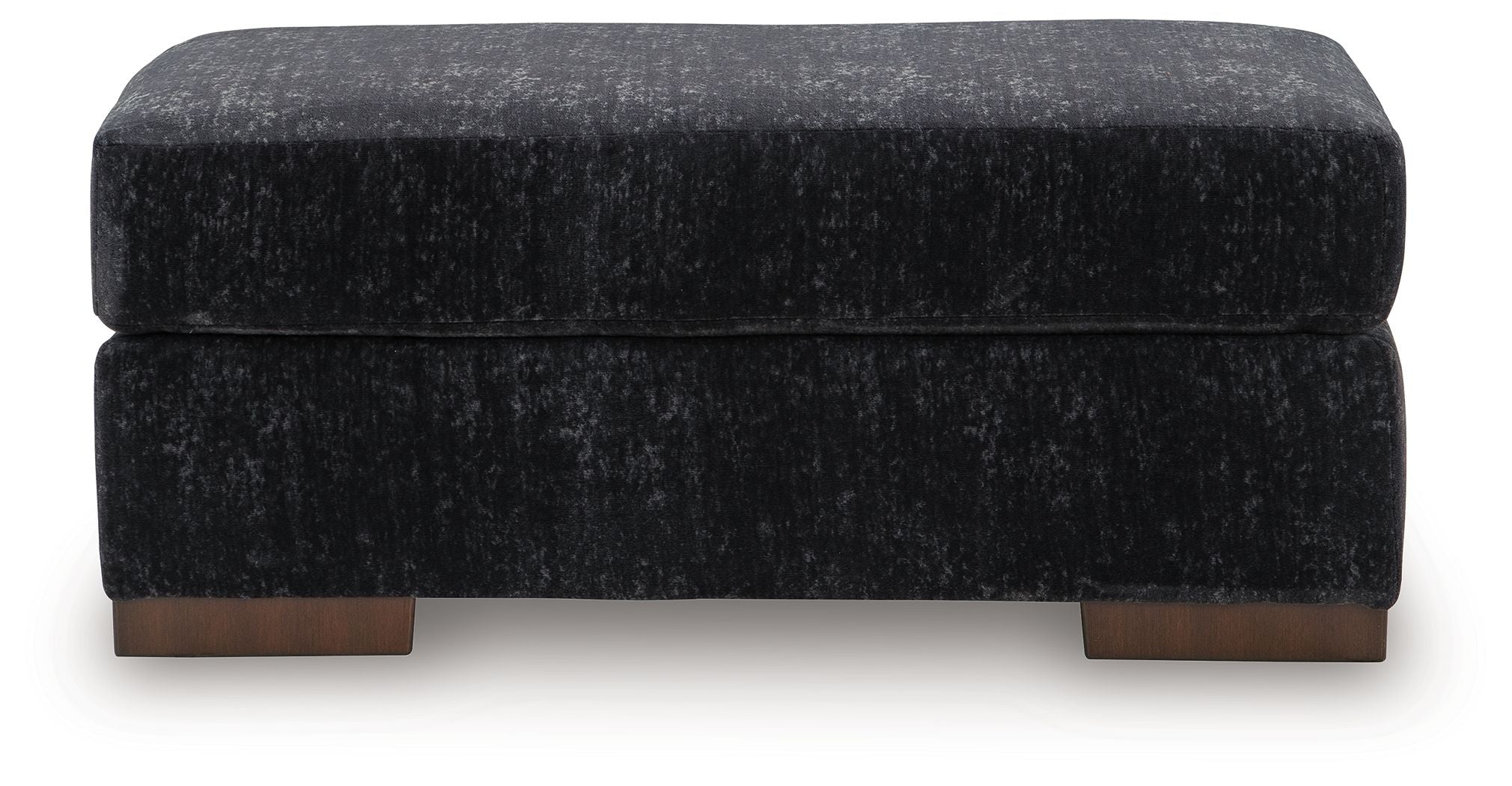 Black upholstered ottoman with stitched top seam and dark wooden feet
