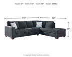 Dark gray L-shaped sleeper sectional sofa with chaise and tufted seat cushions