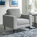 Charcoal upholstered accent chair with matching ottoman, square arms and tapered legs