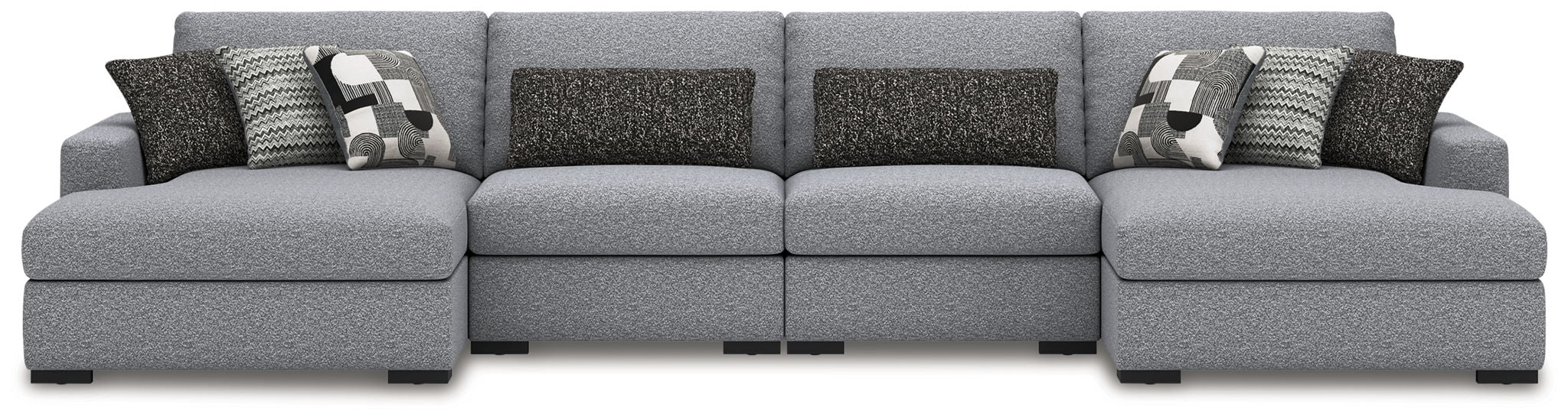 Gray sectional sofa with chaise extensions and two-pattern throw pillow set