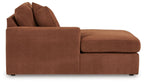 Spice brown corner chaise with low back and padded ottoman seat.