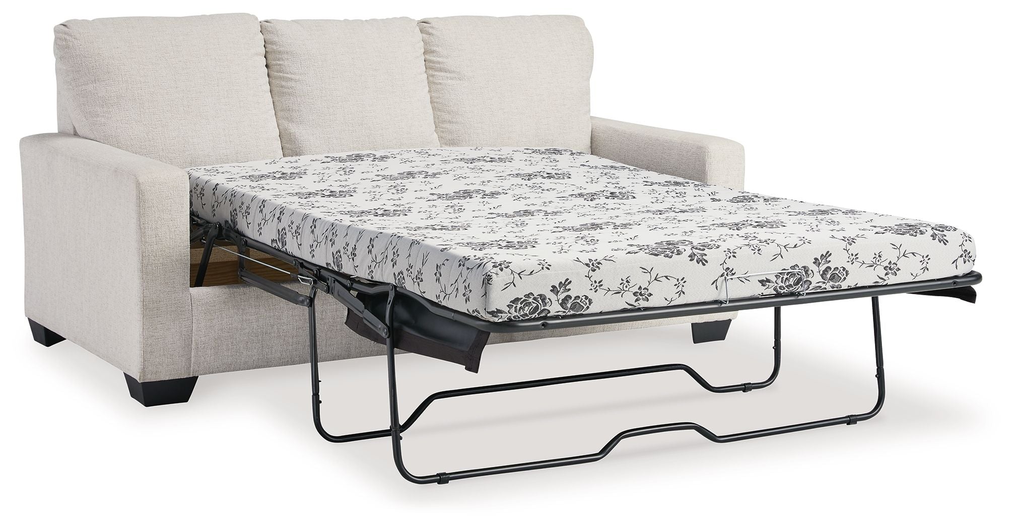 Light beige sofa bed with pulled-out mattress and floral patterned cover