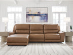 Power reclining sectional sofa with chaise-style footrests in tan leather