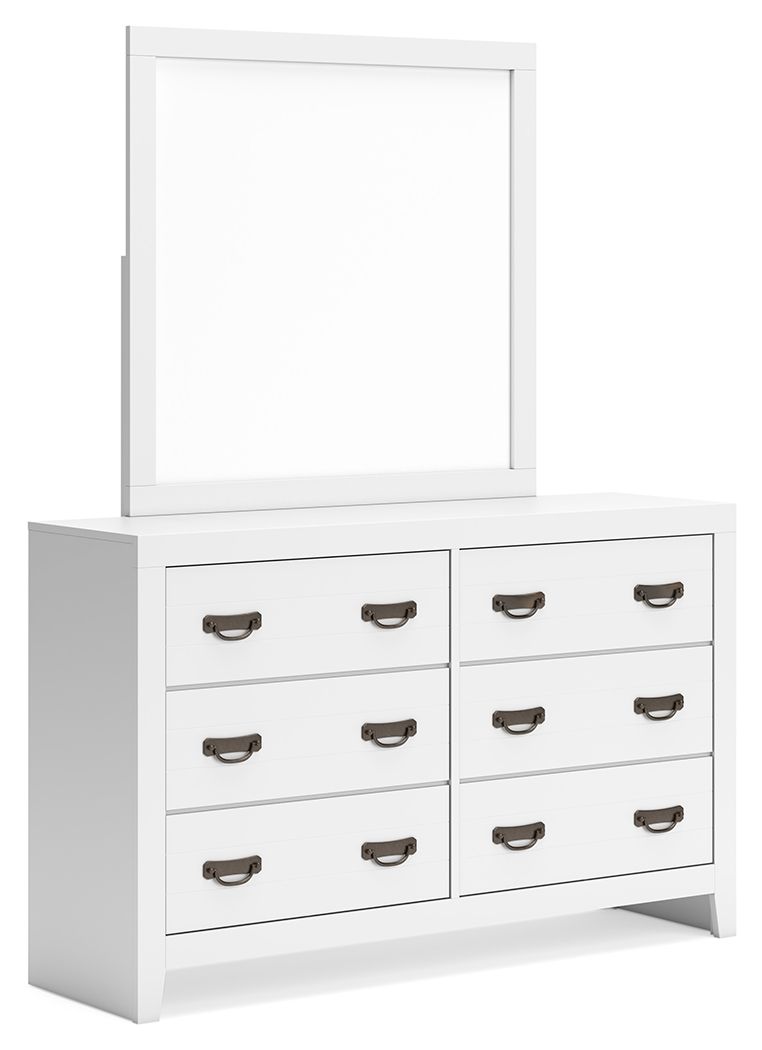White dresser with attached rectangular mirror and six drawers with bronze handles