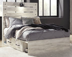Beige panel bed with white bedding and two front drawers; black lamp fixtures at headboard