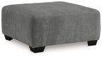 Gray oversized accent ottoman with rounded top and black legs