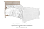 Queen sleigh headboard in whitewash wood with tall arched frame