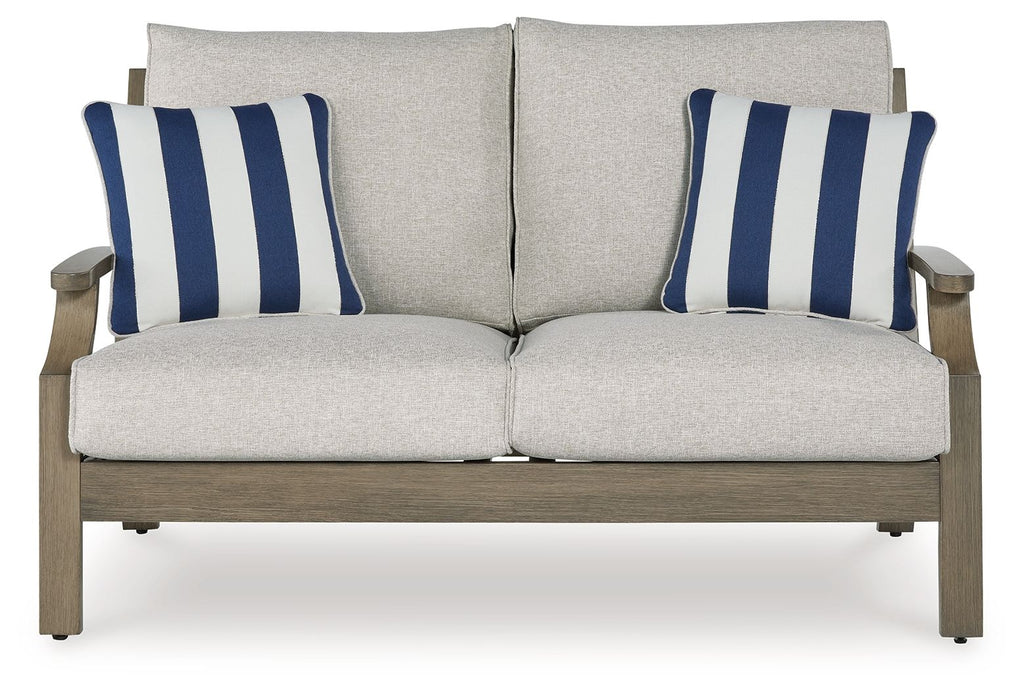 Loveseat with cushion, light gray upholstery with two matching blue-and-white striped pillows