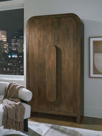 Medium brown accent cabinet with arched doors and recessed vertical handle