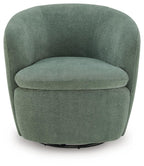 Swivel accent chair in deep green velvet with rounded seat and supportive back.