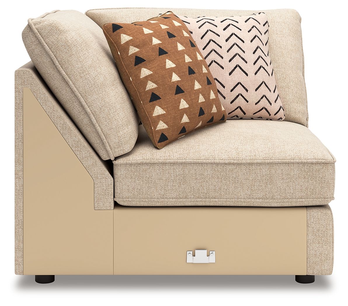 Beige fabric wedge chair with two patterned geometric throw pillows