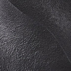 Textured black poly lamp base detail with sculpted surface