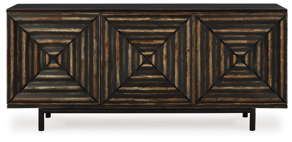 Distressed black accent cabinet with three geometric door fronts and four legs.