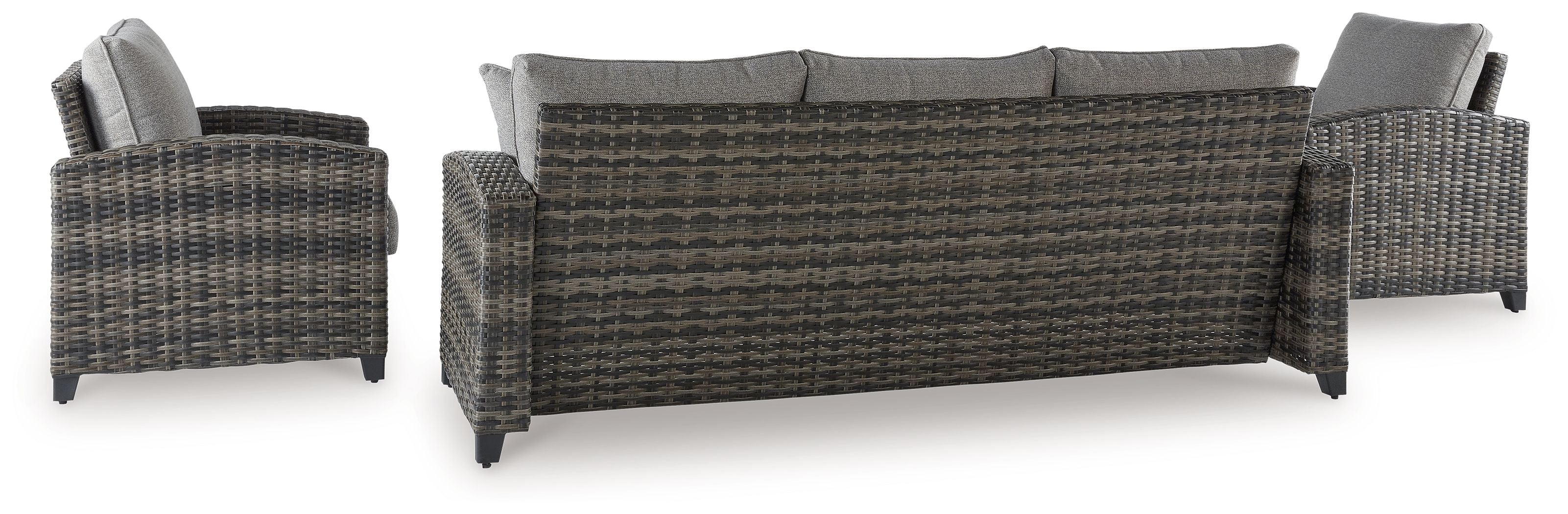 Gray wicker outdoor sofa and two armchairs with coffee table