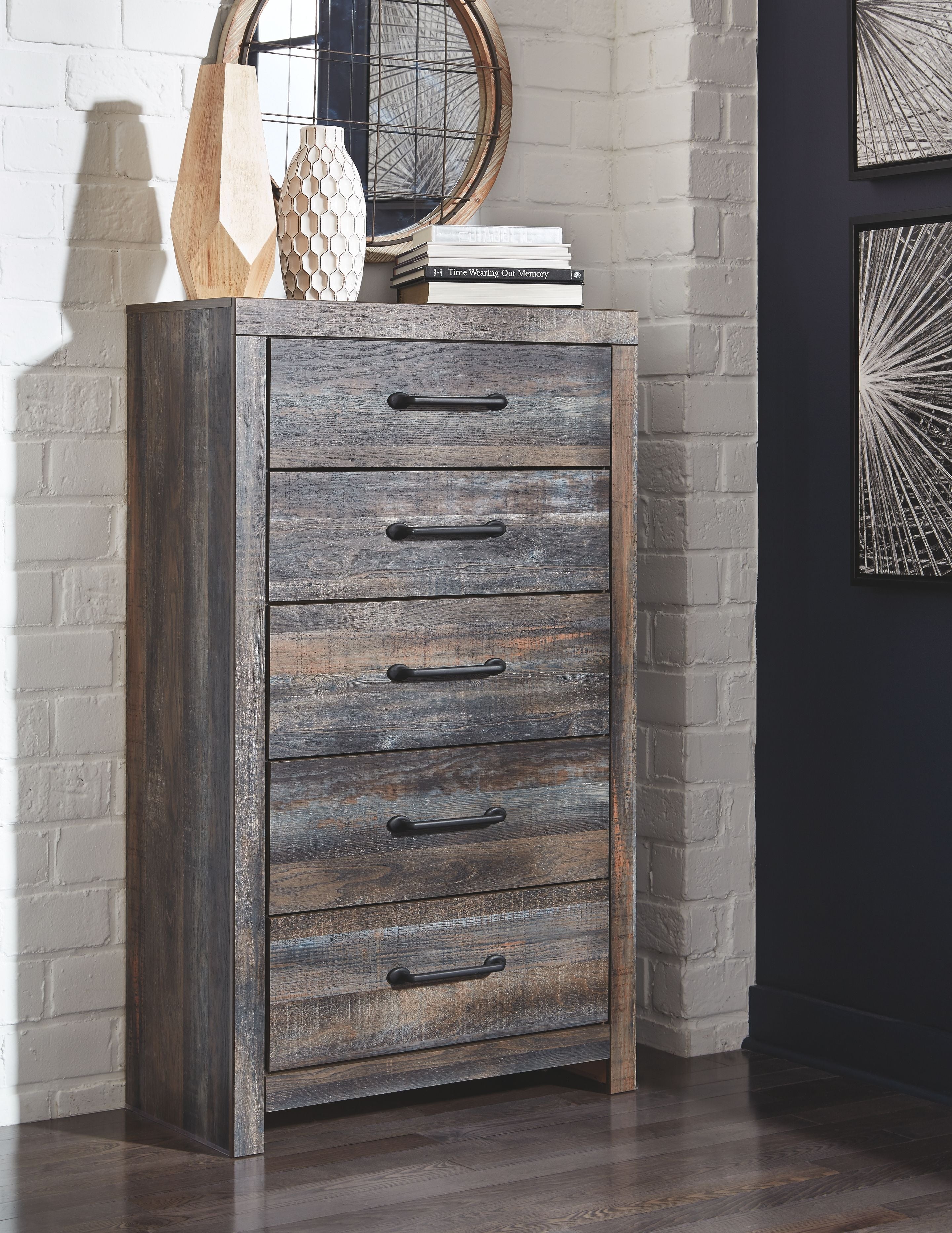 Dark gray wooden dresser with 5 drawers and metal bar pulls, upright front view