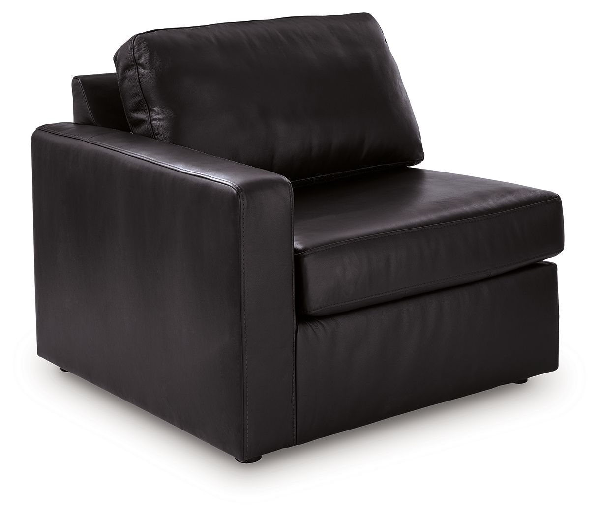Black upholstered corner chair with wide armrests and tufted back cushion