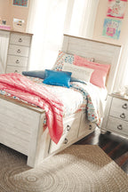 Beige upholstered headboard with tall panel design at the bed corner
