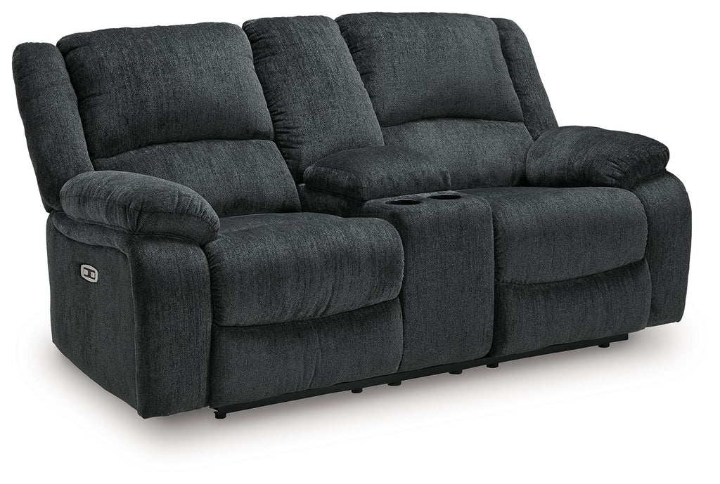 Dark gray reclining loveseat with rounded armrests and tall back cushions