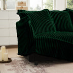 Green U-shape sectional sofa with deep seat and ribbed cushions