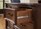 Dark brown dresser drawer with metal knobs and smooth sliding rail mechanism