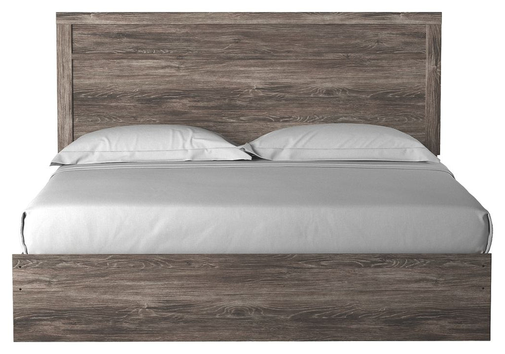 Dark gray wood-look panel bed with white bedding and pillows