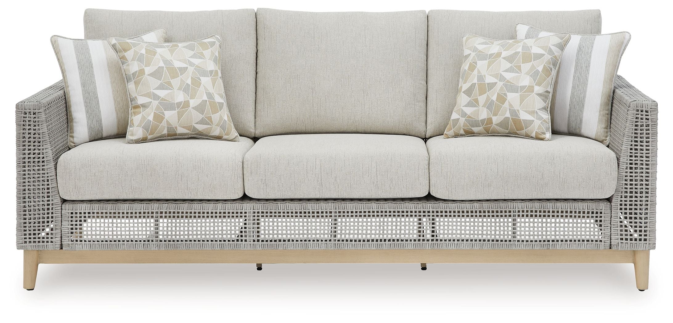 Gray woven sofa with cushions and matching striped back pillows