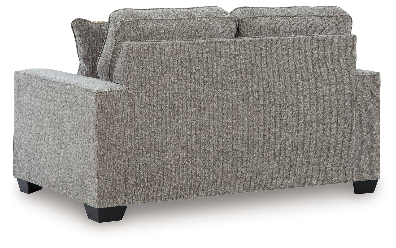 Gray upholstered loveseat with two back cushions and thick armrests