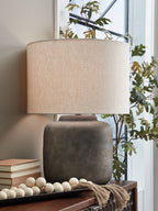 Zandophen metal table lamp with beige drum shade and antique gray base