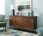 Brown wood accent cabinet with dark legs, three front drawer-like panels