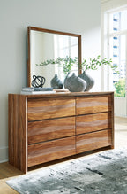Brown wood dresser with tall mirror and drawer storage
