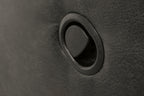 Close-up of pewter fabric rocker recliner armrest surface with stitched seam.
