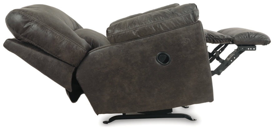 Pewter rocker recliner chair from side with exposed rocker base and lever.