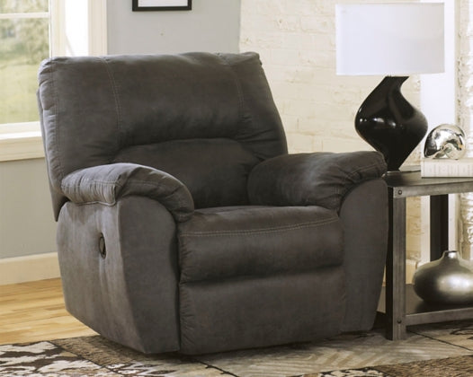 Pewter rocker recliner chair with tall back, padded arms, and reclined seat.