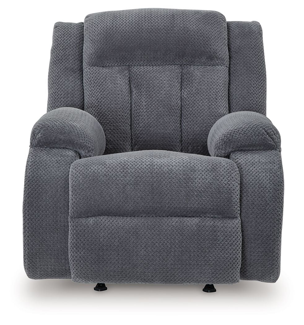 Fabric power rocker recliner with high back, dark steel-gray upholstery, wide seat