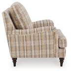Beige striped accent chair with rolled arms and thick back cushion, dark wooden legs