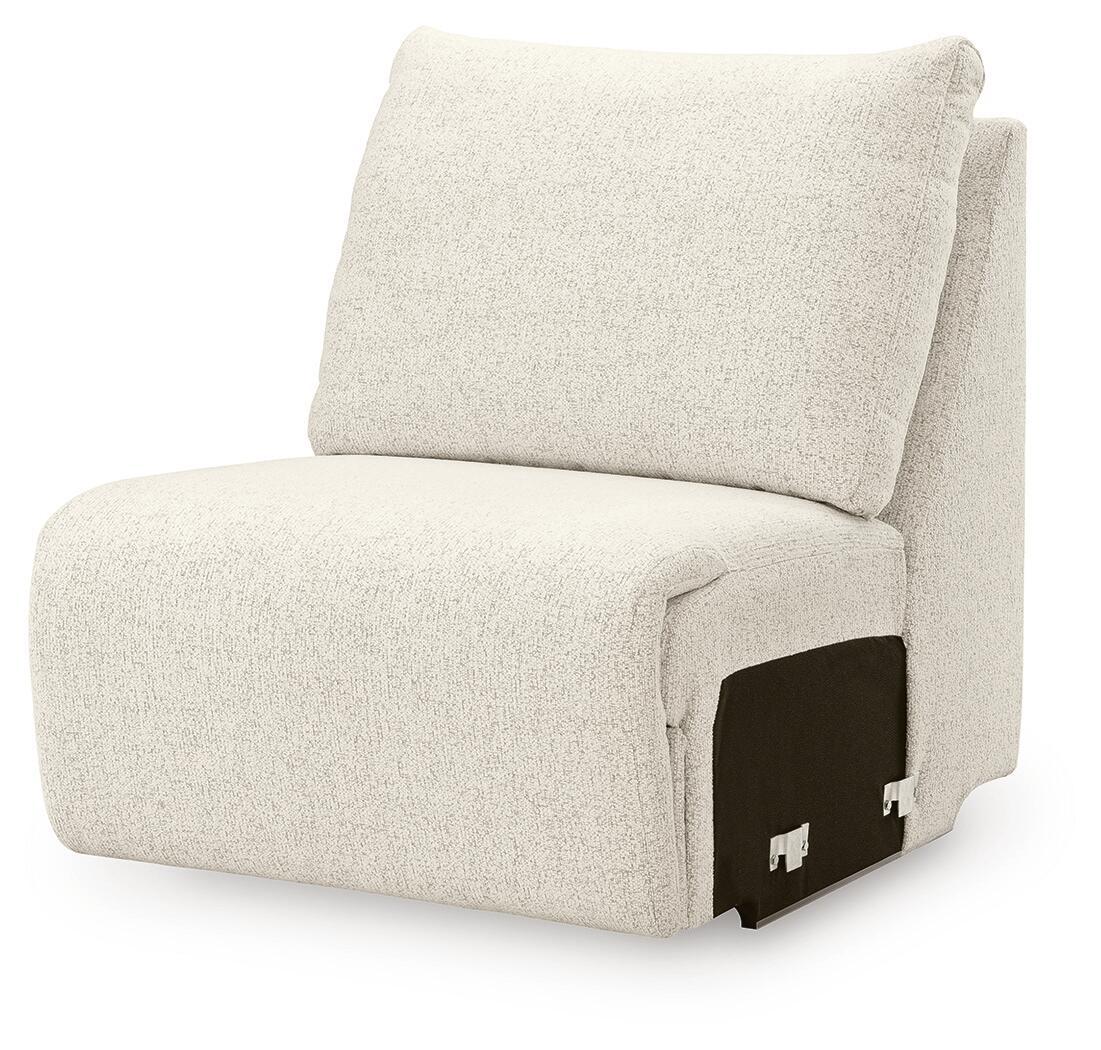 Beige armless chair shown from the side, upholstered seat and back cushions