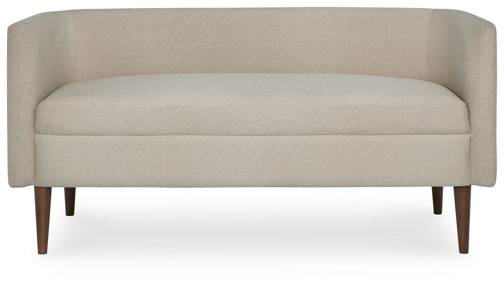 Beige upholstered accent bench with low profile back and two-cushion seat, tapered legs