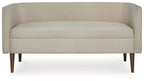 Beige upholstered accent bench with low profile back and two-cushion seat, tapered legs
