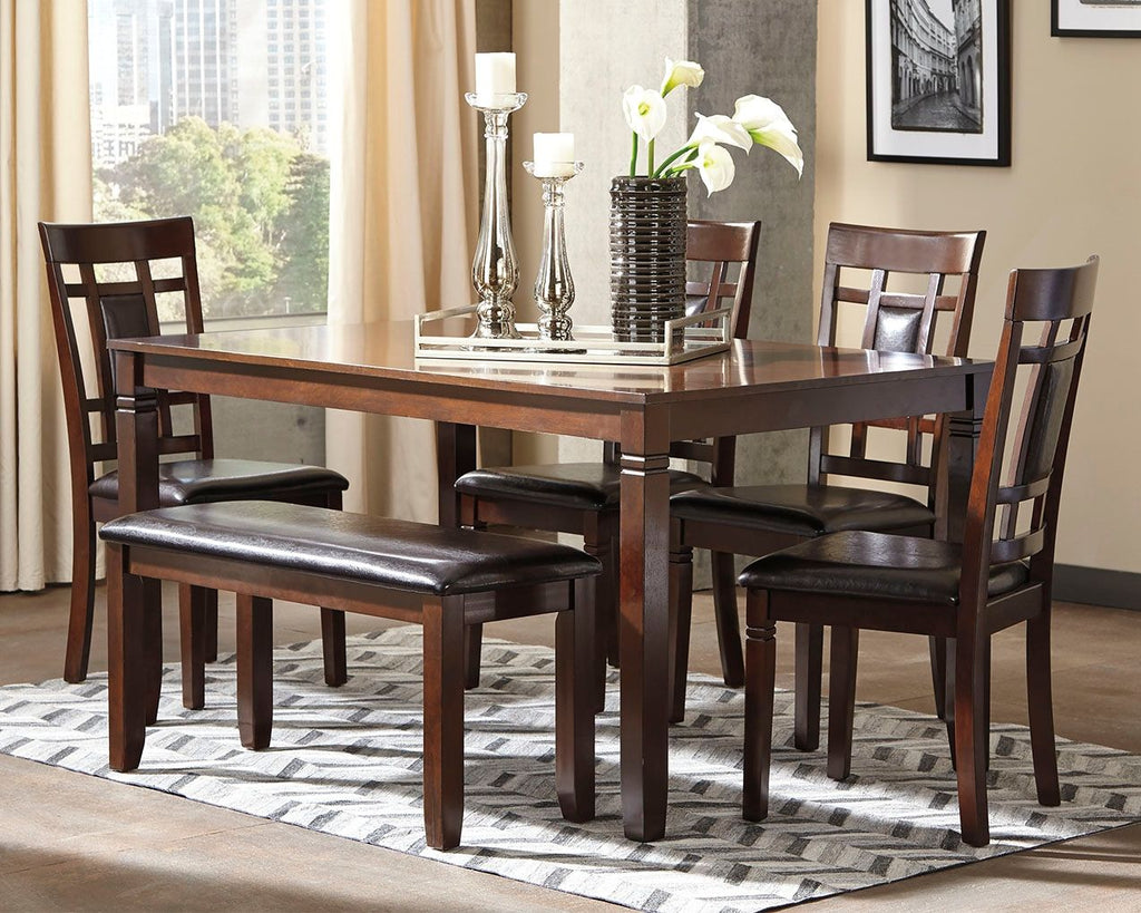 Brown dining table set with rectangular table and dark leather-look benches and chairs